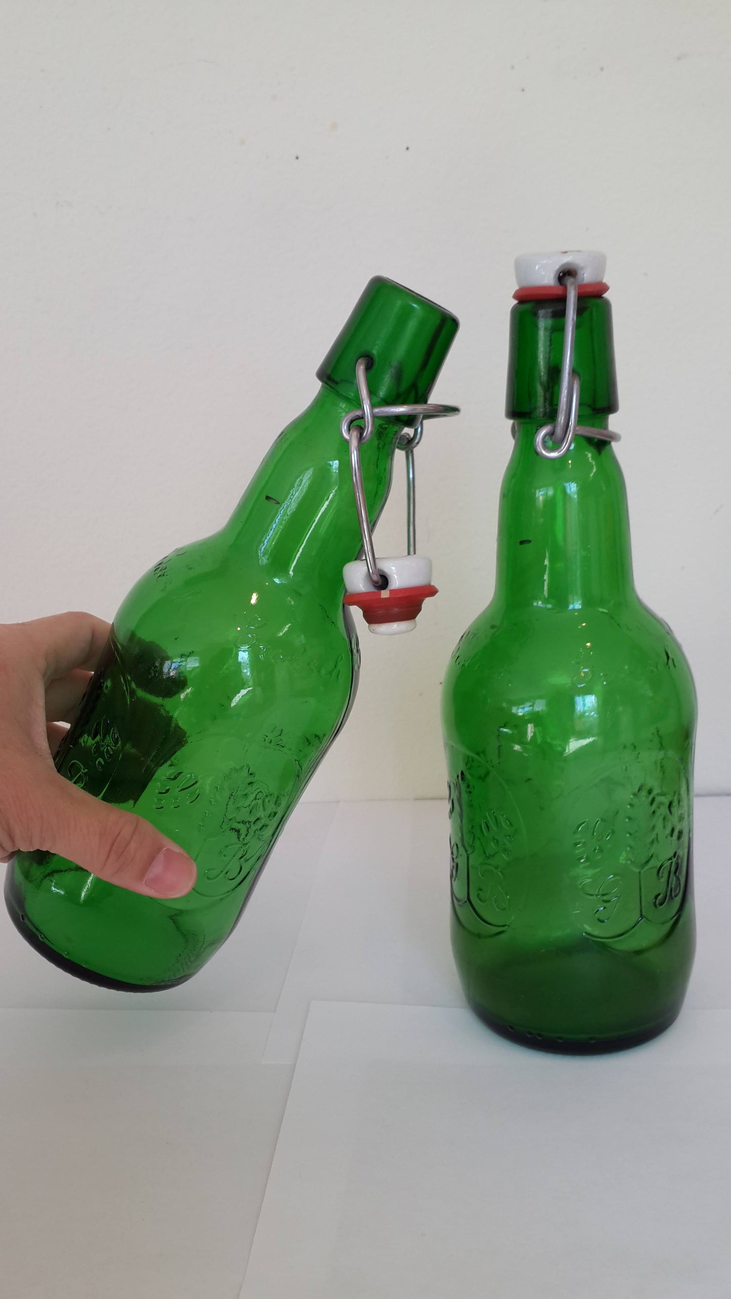 Green glass bottles with stopper, vintage stock