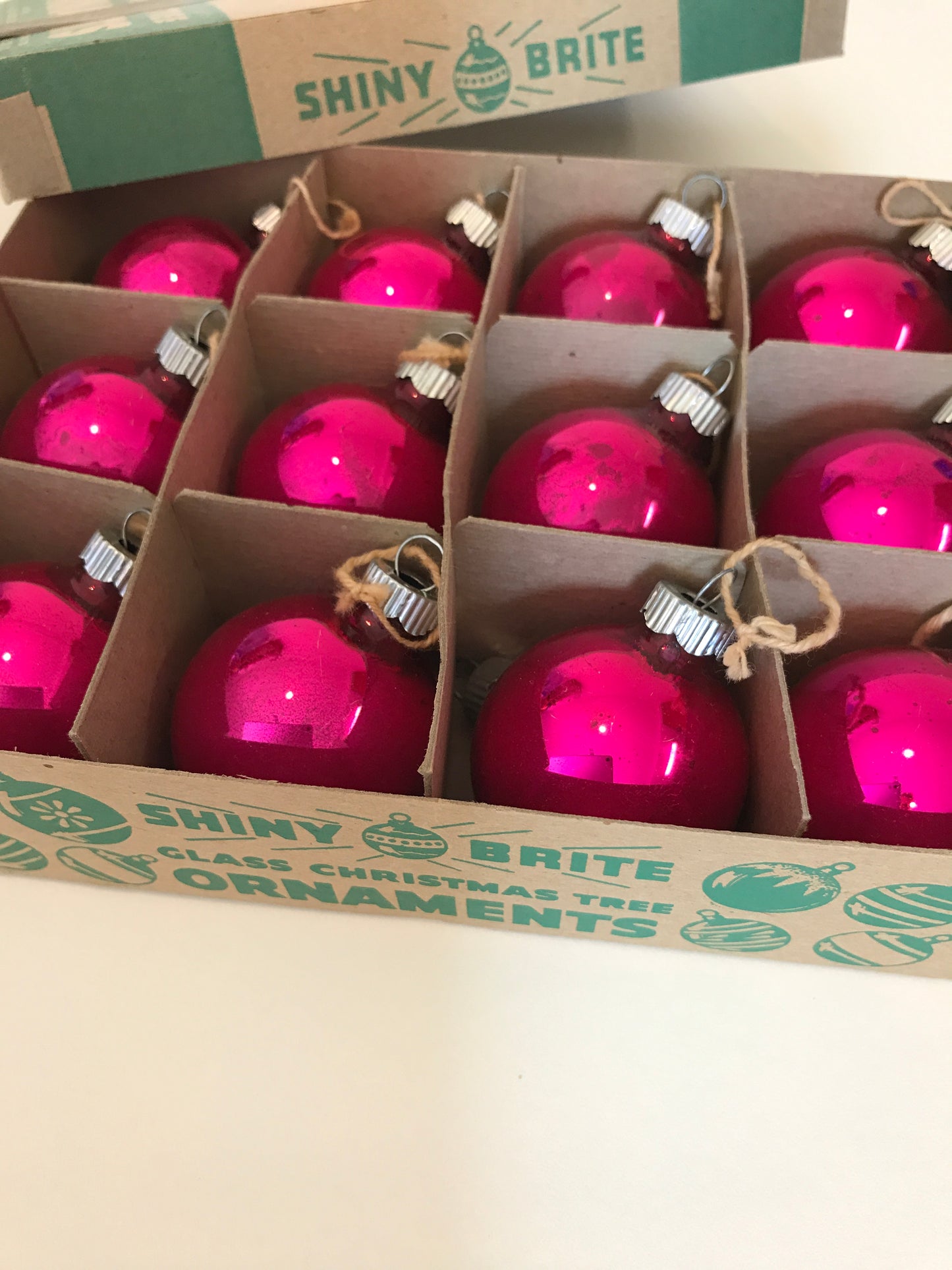 Shiny Brite Christmas ornaments in hot pink