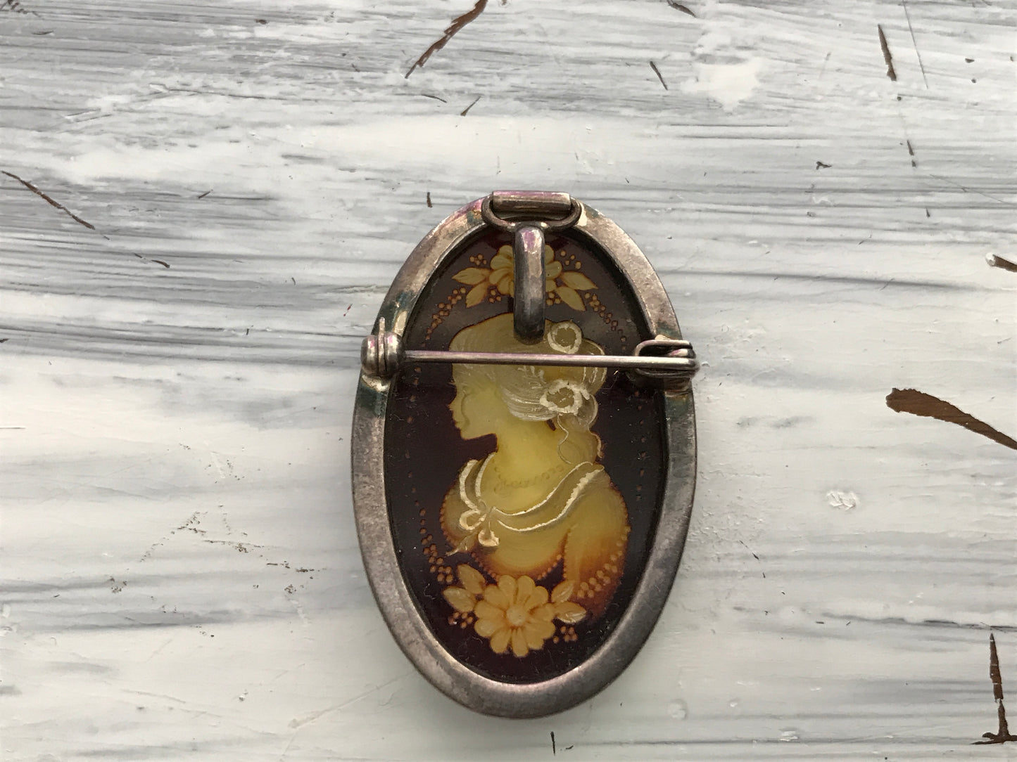 Large cameo carved amber pendant