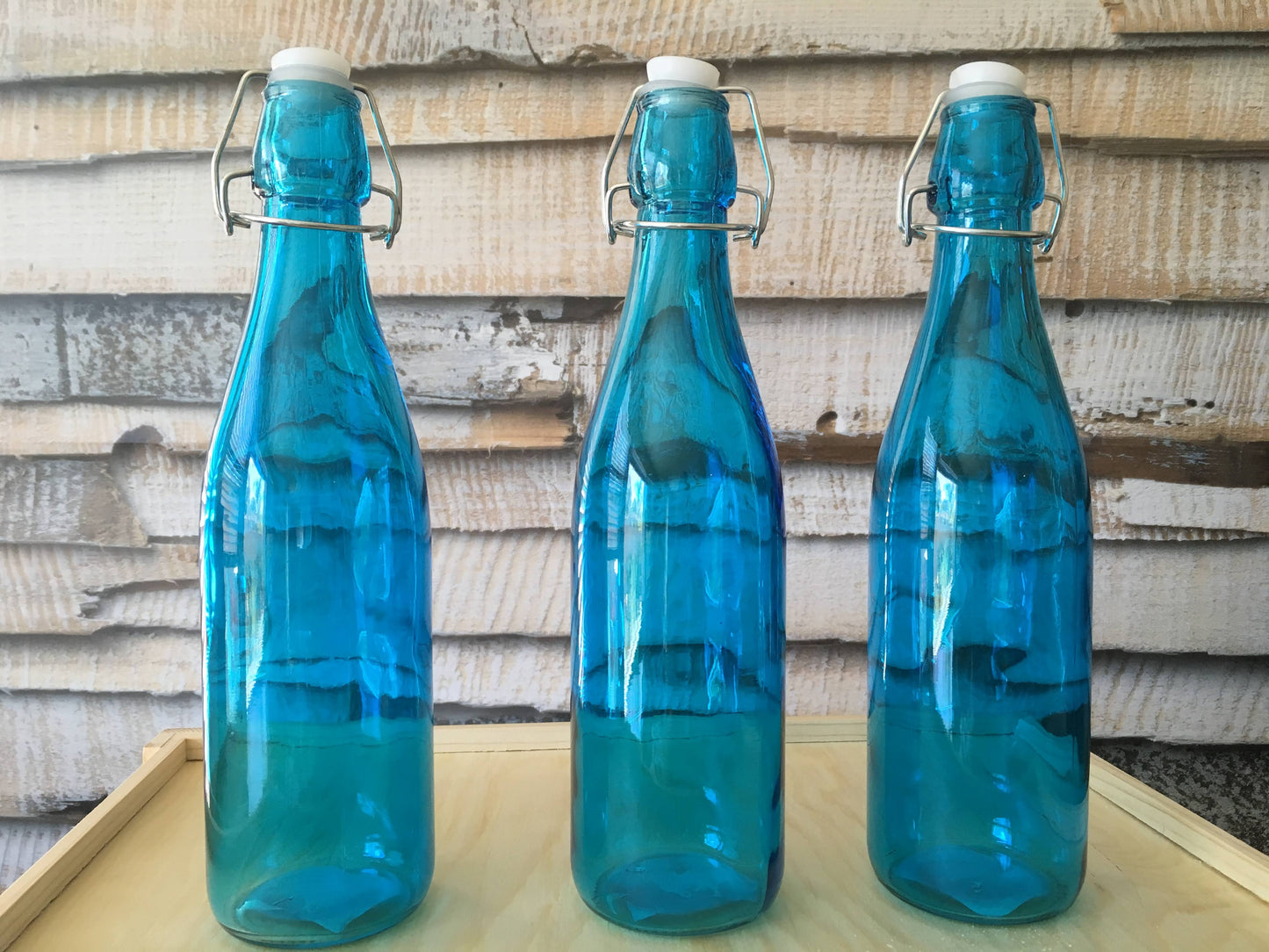 Tall blue glass bottle