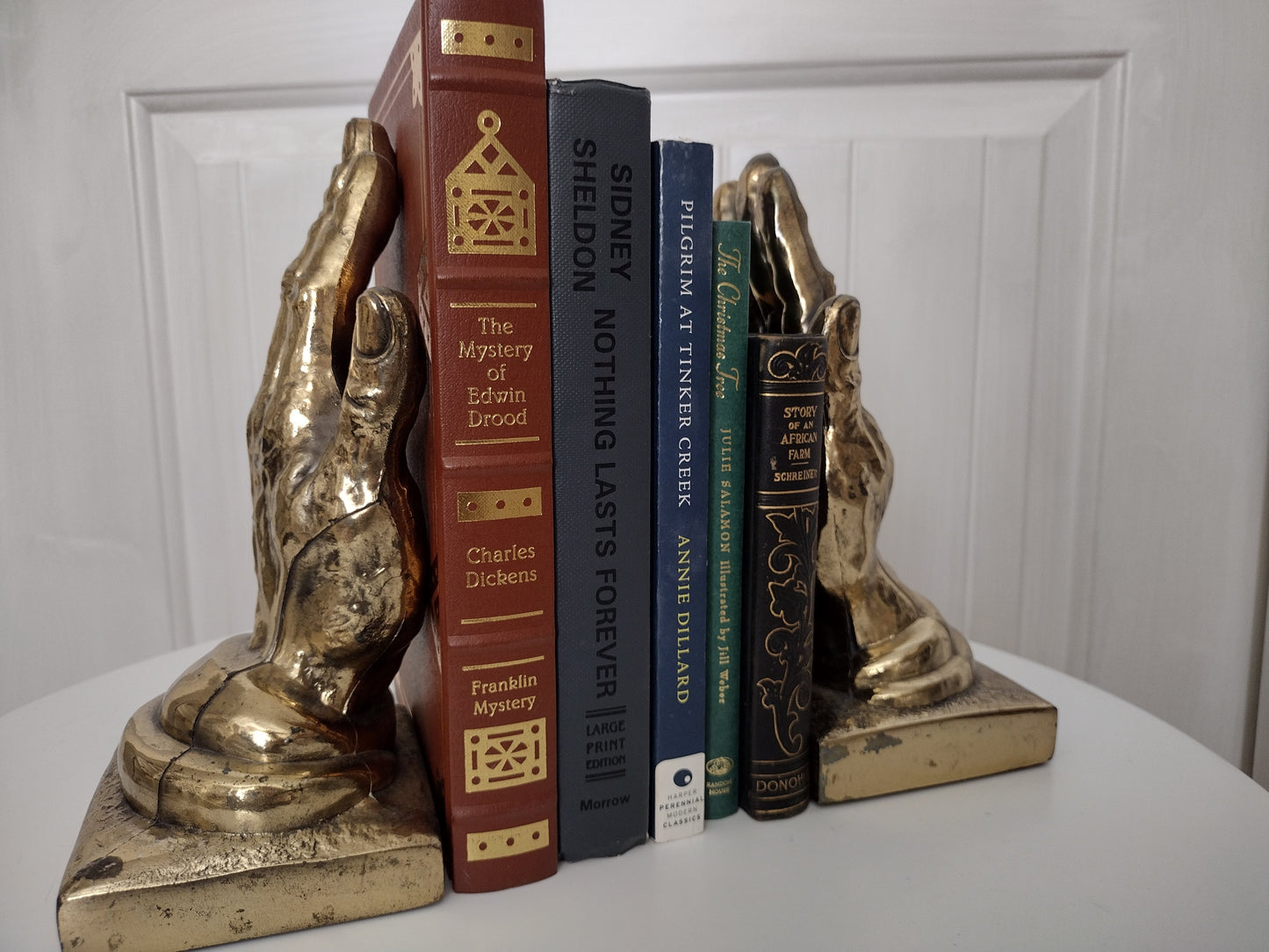 Vintage brass hand bookends