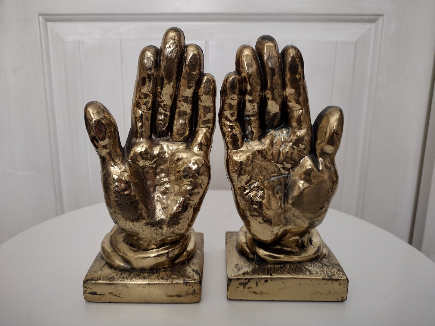 Vintage brass hand bookends