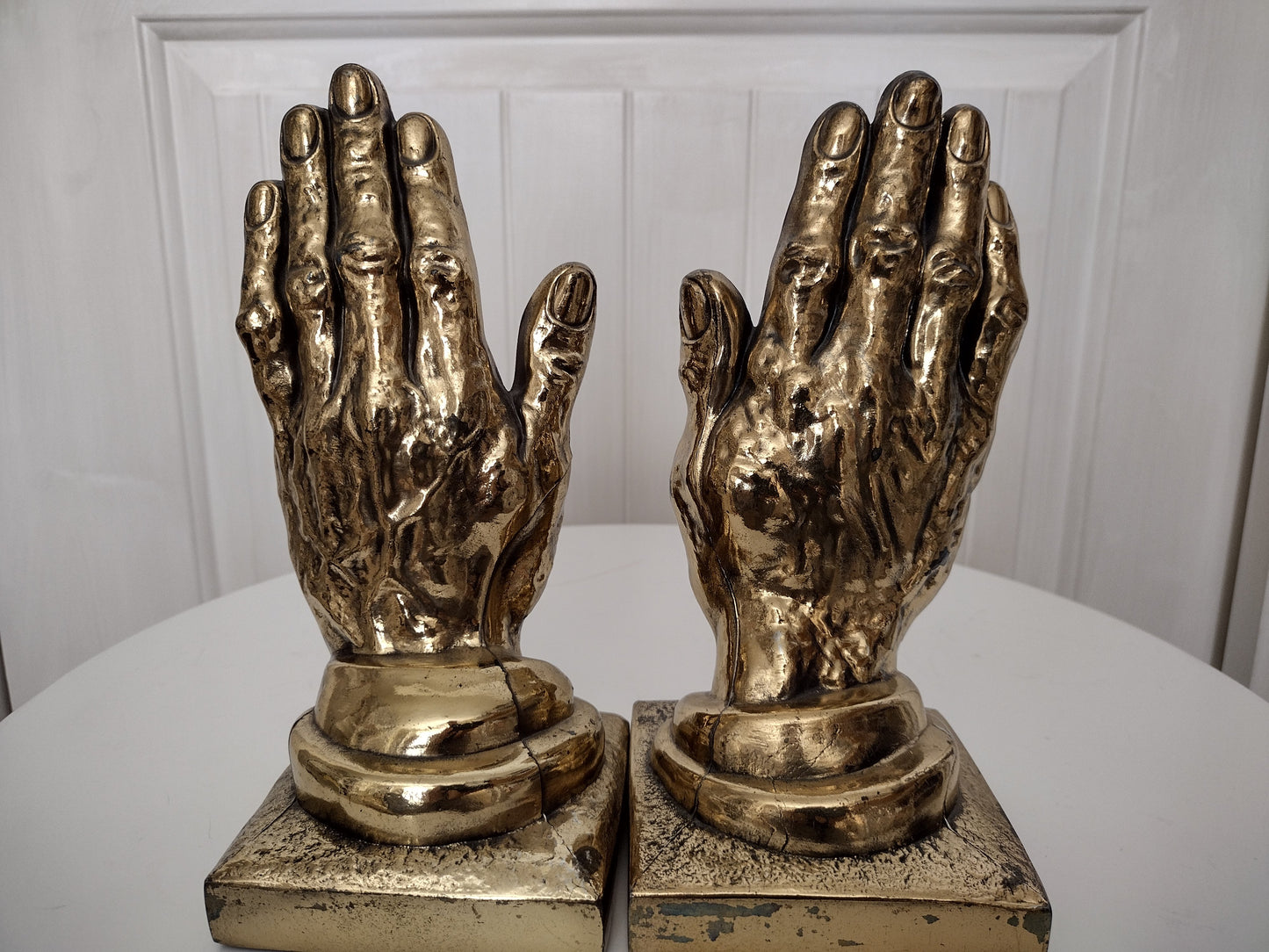 Vintage brass hand bookends