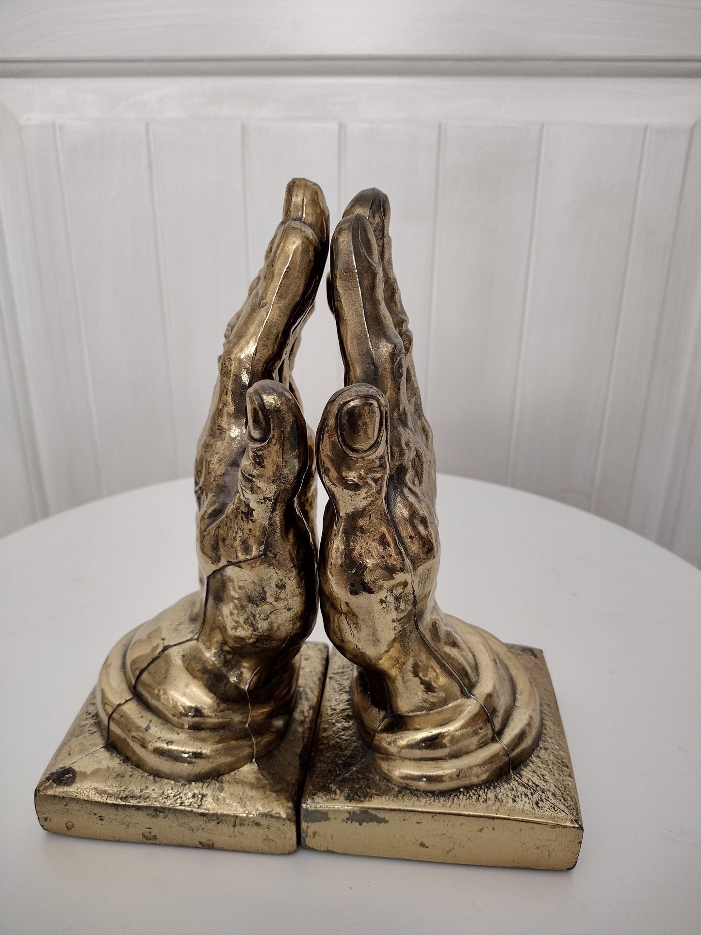 Vintage brass hand bookends