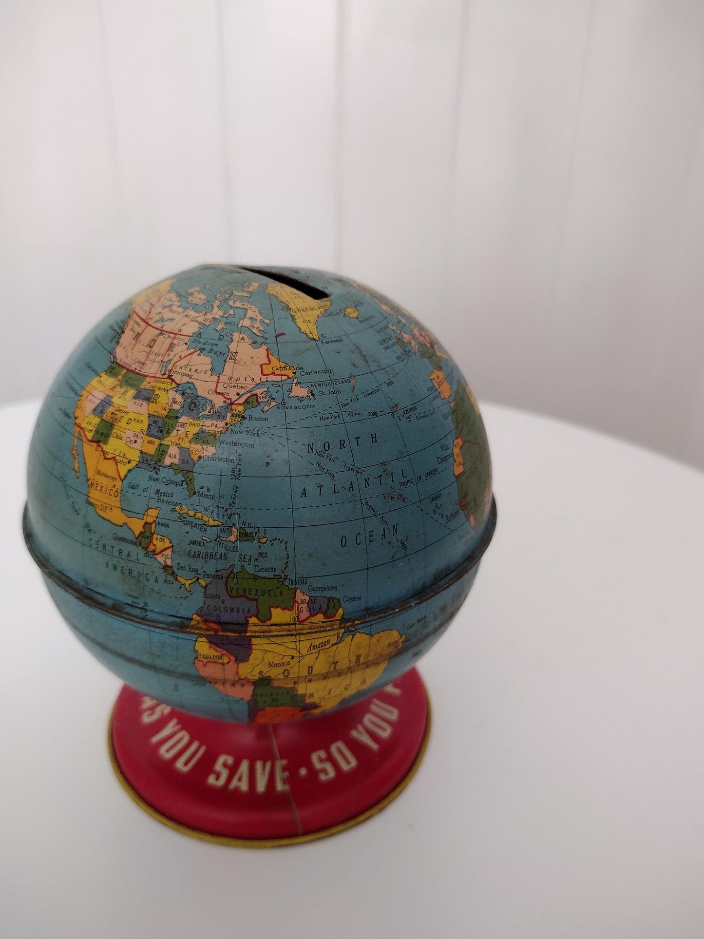 Vintage globe coin bank