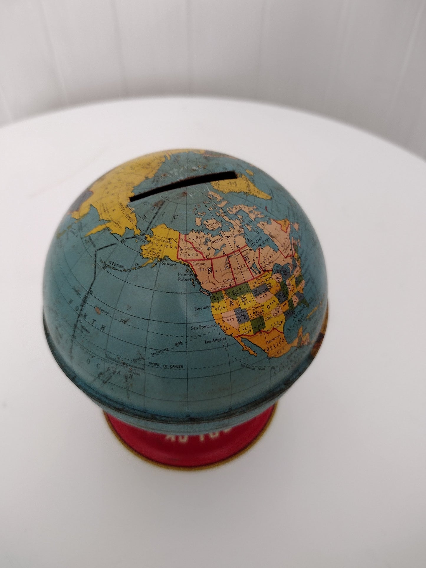 Vintage globe coin bank