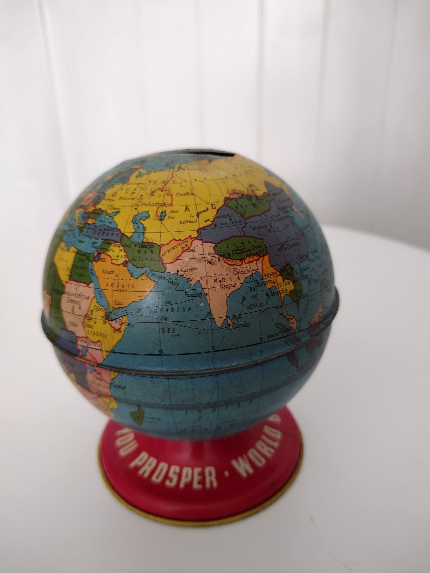 Vintage globe coin bank