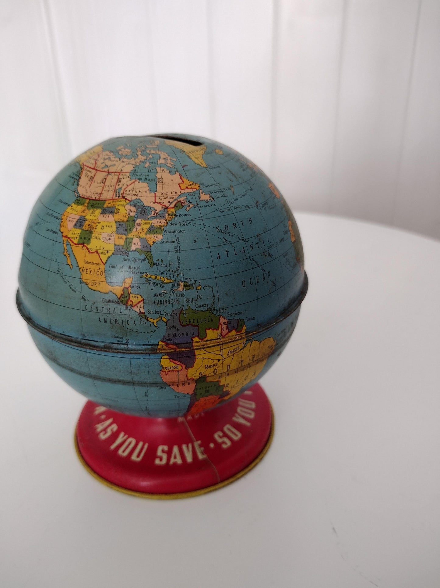 Vintage globe coin bank