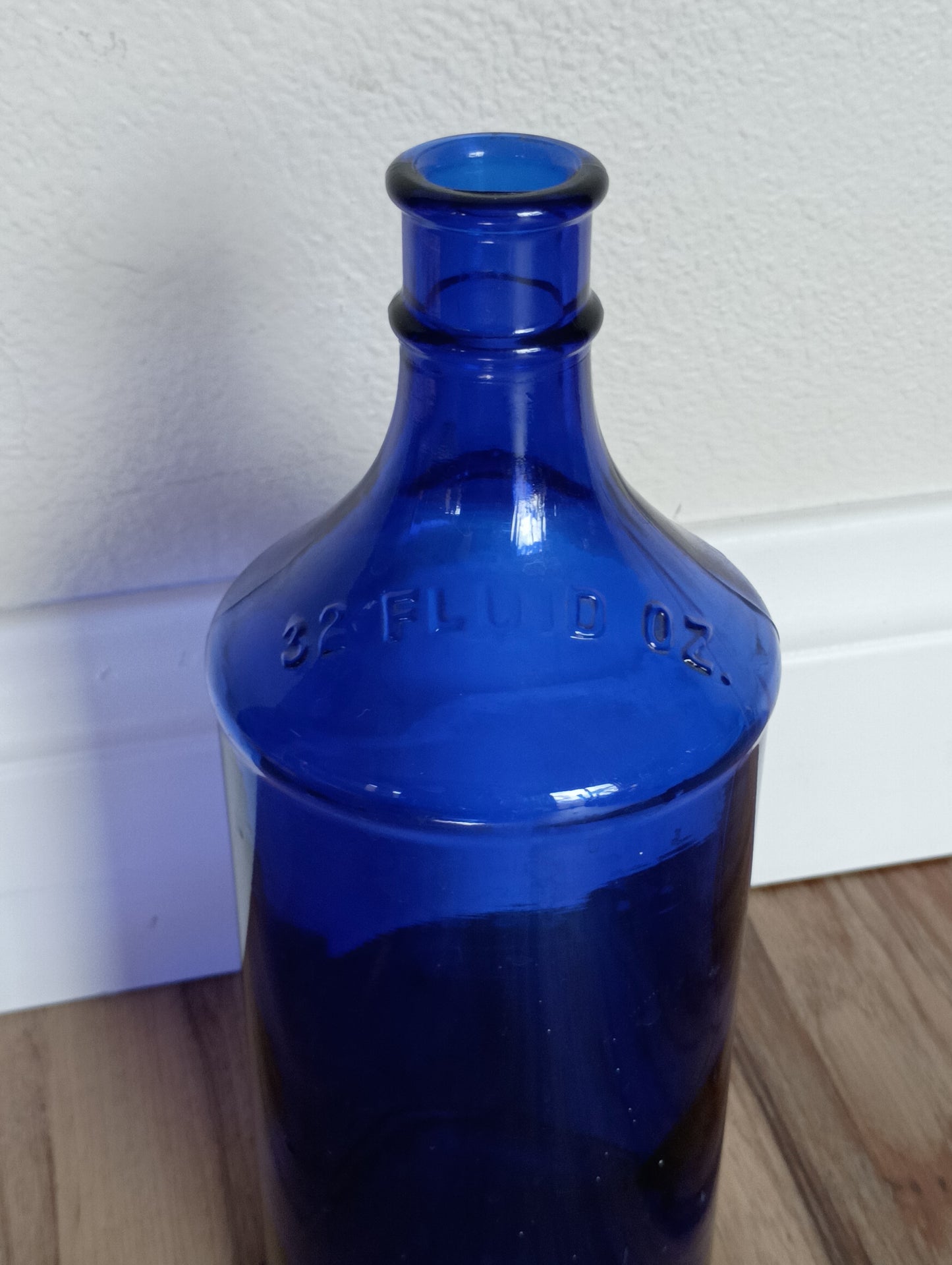 Cobalt blue glass large bottle, vintage