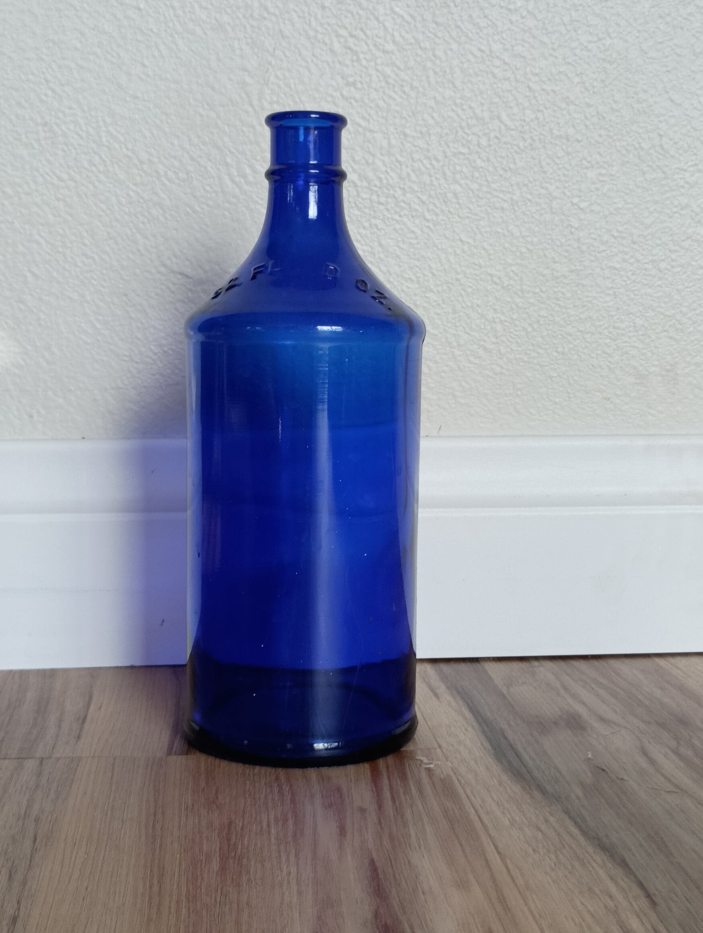 Cobalt blue glass large bottle, vintage