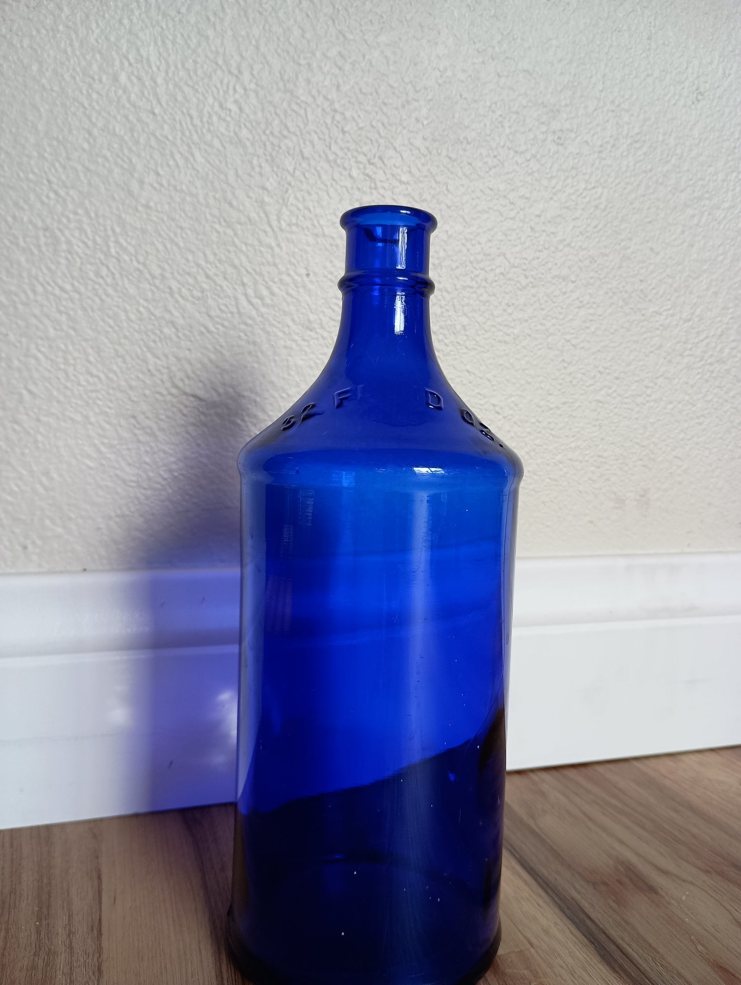 Cobalt blue glass large bottle, vintage