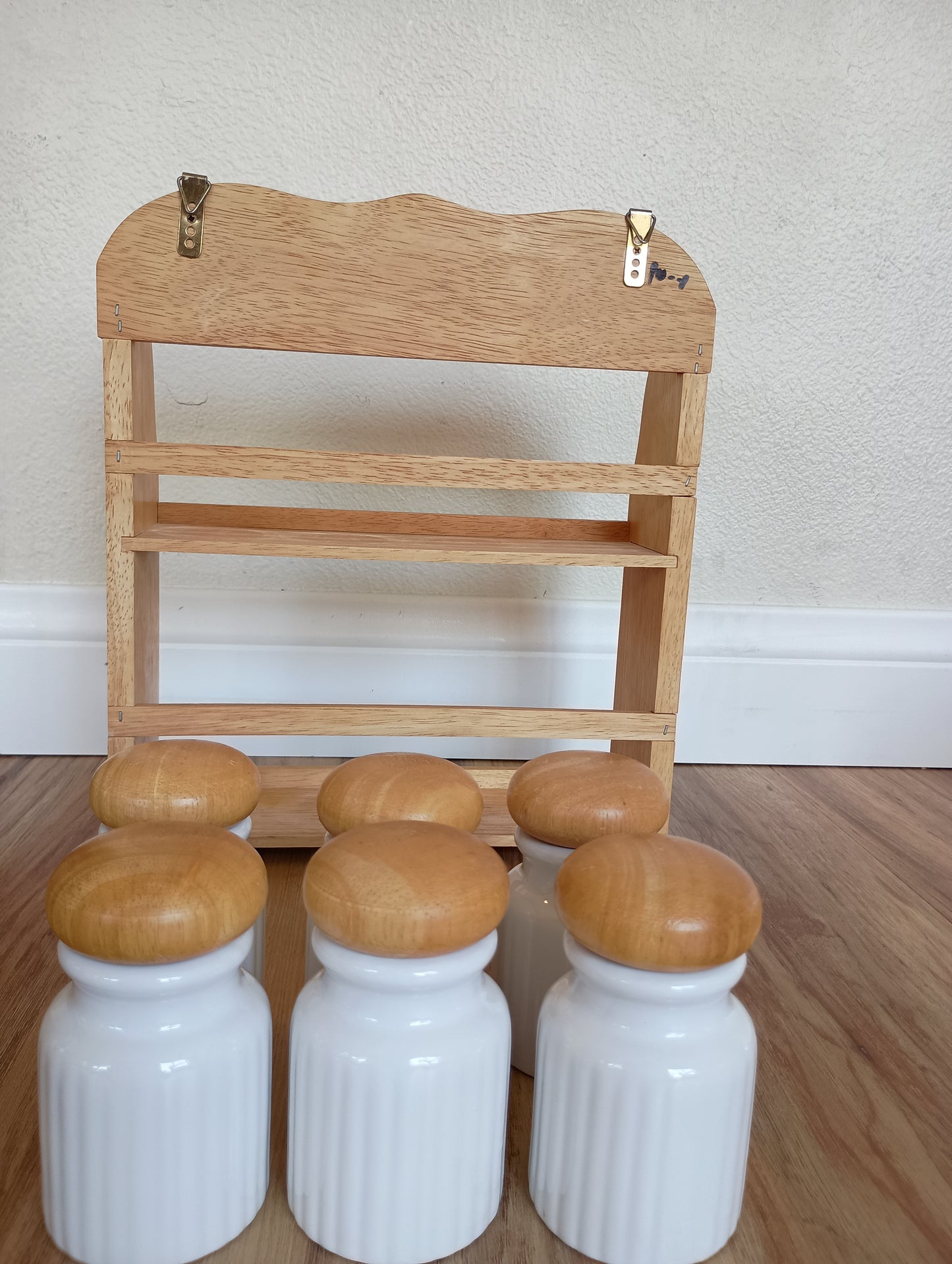 Spice rack, little white Jared with wood lids, vintage