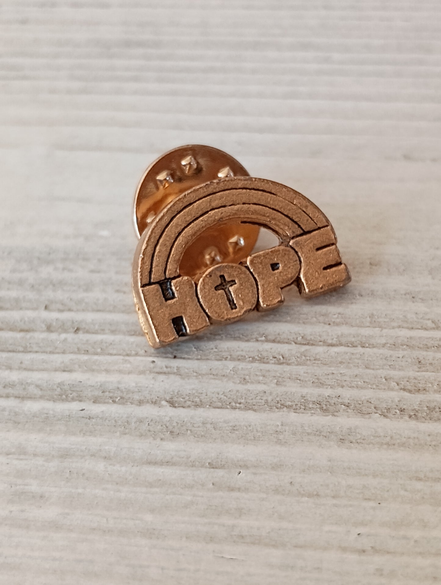 Gold HOPE pin, circa 1970