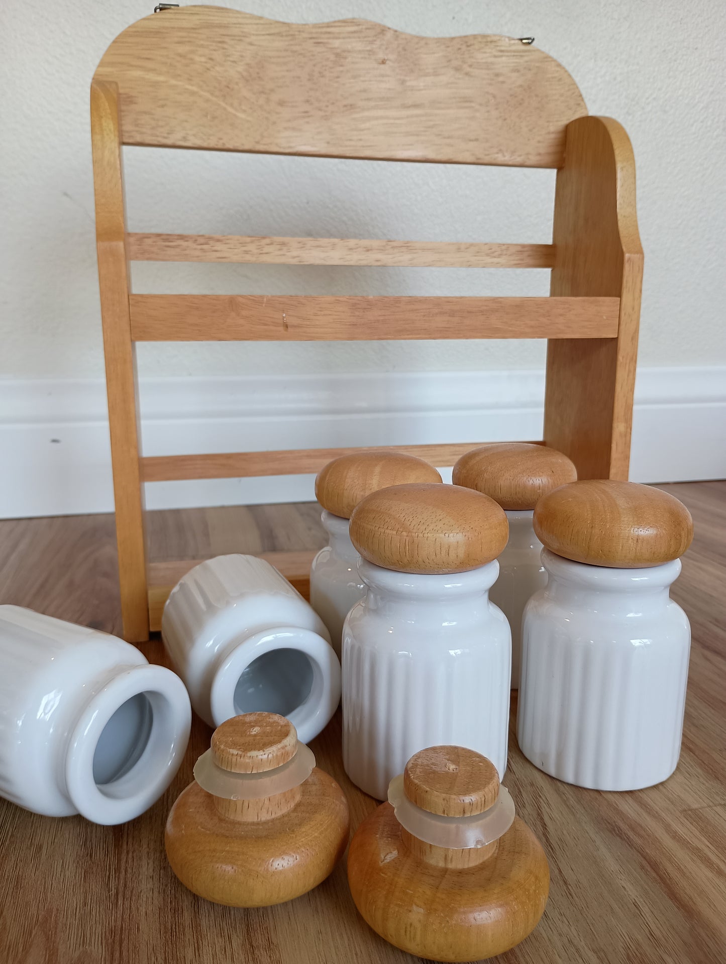 Spice rack, little white Jared with wood lids, vintage