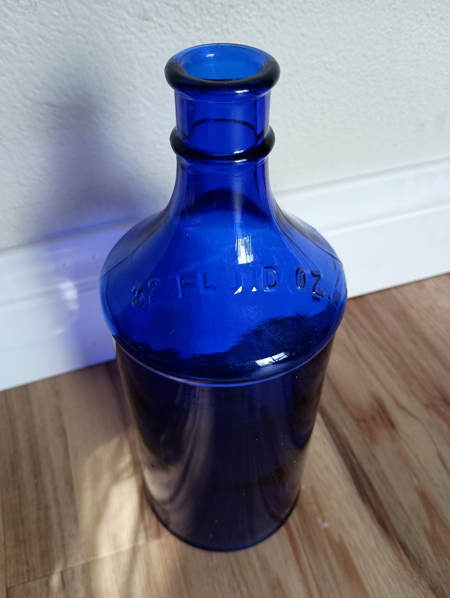 Cobalt blue glass large bottle, vintage